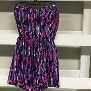 Toxik3 multi colored strapless romper.